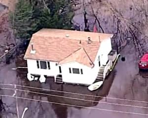 Flyover photo of Linda McMullen's home after a flood