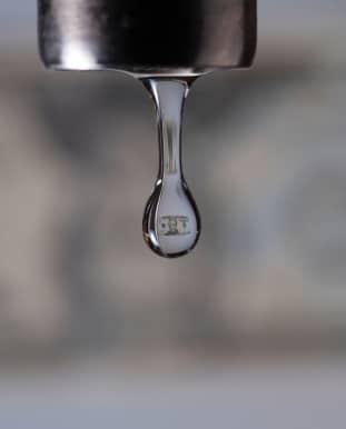 Water dripping from faucet